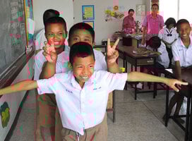 Volunteer with children in Cambodia