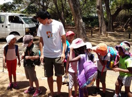 intern with school children