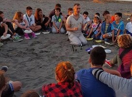 Outdoor classroom learning from volunteers for a variety of countries. 