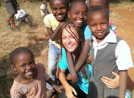 a volunteer working with kids