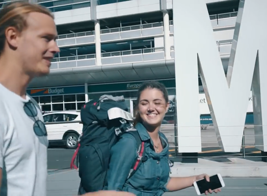 girl at airport with bag