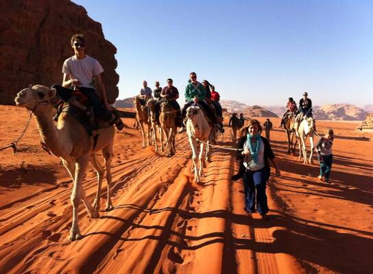 Students explore the Wadi Rum on camels