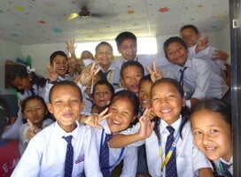 Volunteers and young students in Nepal 