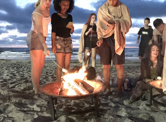 Students at campfire