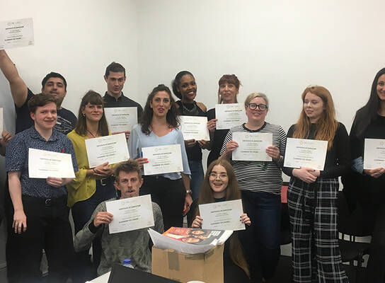 TEFL Graduates Showing their Certificates from London