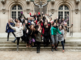 Group of students jumping during trip to Paris