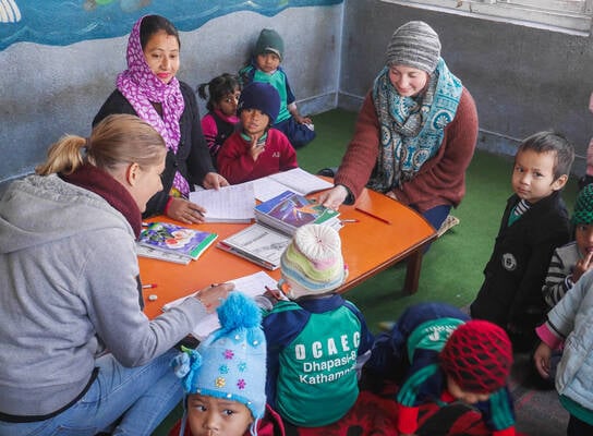 Teach eager to learn children in Nepal