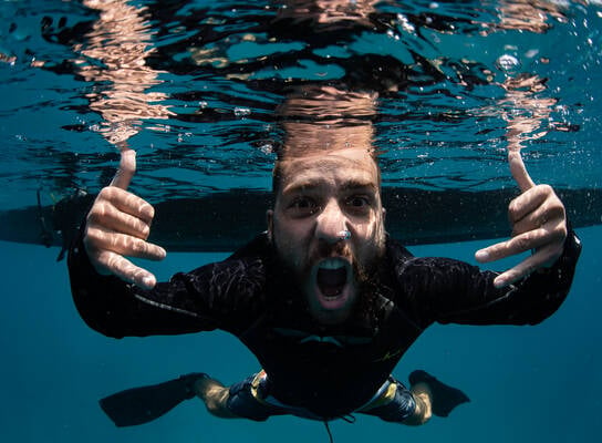 Underwater photo of diver mad about diving