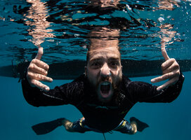 Underwater photo of diver mad about diving