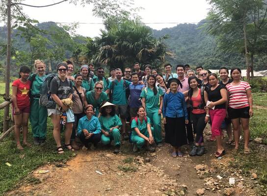 Vietnam team with host family