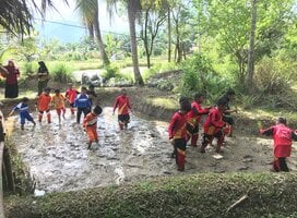 Students Planting Rice at Erna's Farm