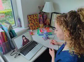 Private Japanese Online lessons; Girl in front of laptop studying Japanese online with a private tutor