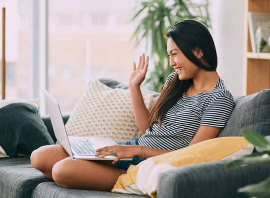 Young woman learning on laptop