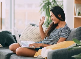 Young woman learning on laptop