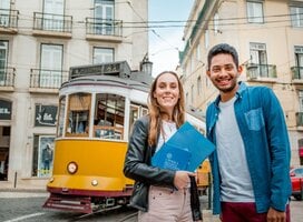 Students pose in front of a cablecar in Lisbon, Portugal
