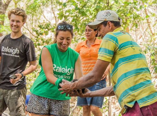 Volunteers and community members work together during the community project