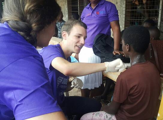 Medical outreach in a school to dress wounds 
