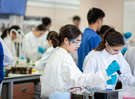 Students conduct physics experiment
