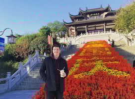 Teacher in Chinese garden. 