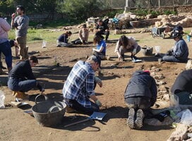 Students digging at excavation site
