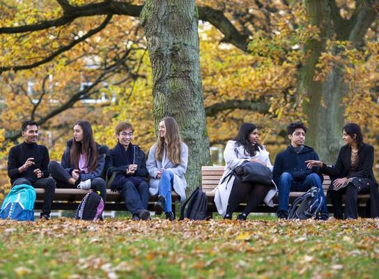 Students sitting on a bench