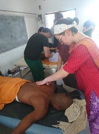 A Volunteer doing treatment by Myotherapy