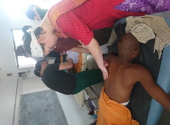 A Volunteer doing treatment by Myotherapy