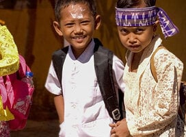 Two children going to school.