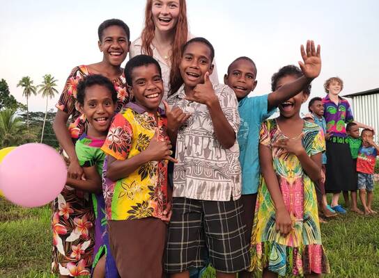Hanging with kids in a local Fijian village 