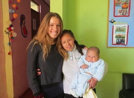 A volunteer with a teenage mother