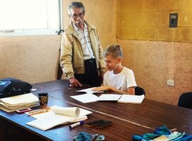 Spanish teacher and student in class