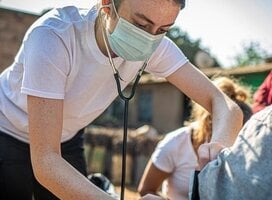 Medical & Community Development volunteer attending to patients