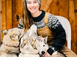 Janna Lee Cushing and Dogs by the cabin