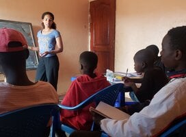 Teaching English to street boys.