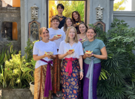 Participants posing with their Balinese offerings Canang Sari 