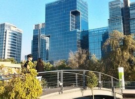 Buildings with trees sorrounding them.