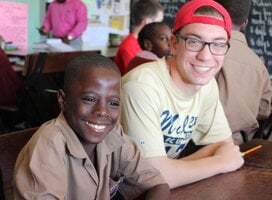 photo of volunteer and young male student
