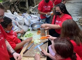volunteers preparing food at the soup kitchen