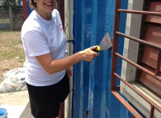 Volunteers doing building maintenance