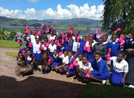 Group of school-going girls with Happy Girls Project's health kit