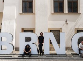Students with Brno sign