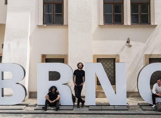 Students with Brno sign