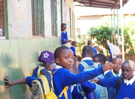 Students at Mrupanga Primary entering the class ready for a mental health club session with FEF