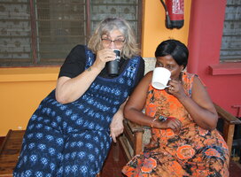 Volunteer enjoying tea with Headmistress