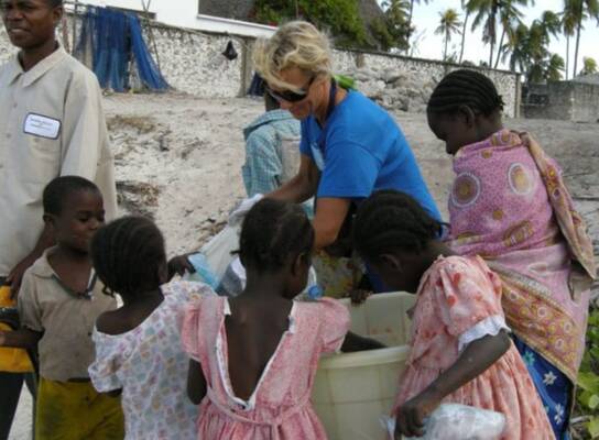 A volunteer with the kids in Haiti