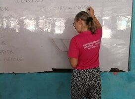 Sisi from France giving lessons to Junior High Students