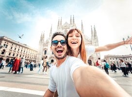 Two Italian for a While gap year students in front of Duomo di Milano