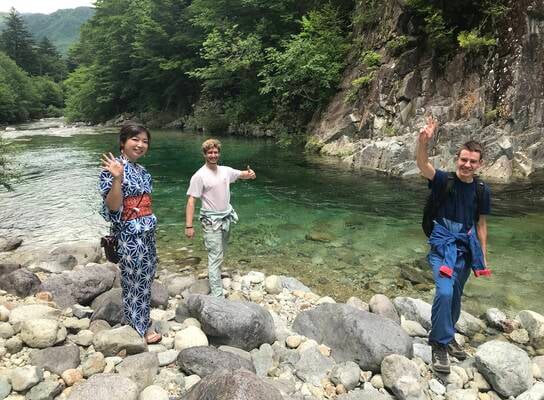 standing by river