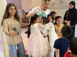 Children brining smiles to the staff and volunteers at the centre