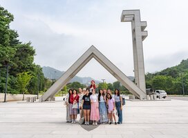 SPARKS Students pose by the gates of Seoul National University